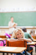 Schoolboy not paying attention to lesson