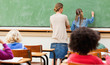 Photo : Back view of teacher and pupil on the blackboard Back view of teacher and pupil on the blackboard