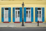 Photo: Blue shutter and lamp post in French Quarter near Bourbon Street in New Orleans, Louisiana Blue shutter and lamp post in French Quarter near Bourbon Street in New Orleans, Louisiana