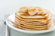 pancakes with banana and syrup