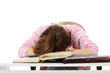 Foto: Student girl is sleeping on the desk. Student girl is sleeping on the desk.