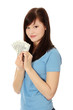 Young woman holding money