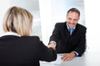 Businessman at the interview shaking hands