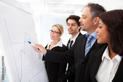 Photo: Group of business people at presentation Group of business people at presentation