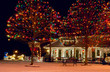 An old village train depot lit up for Christmas
