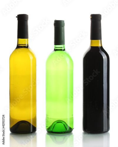 Photo: bottles of wine isolated on white bottles of wine isolated on white