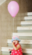 girl in the hat on the stairs