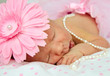 Adorable sleeping newborn baby girl