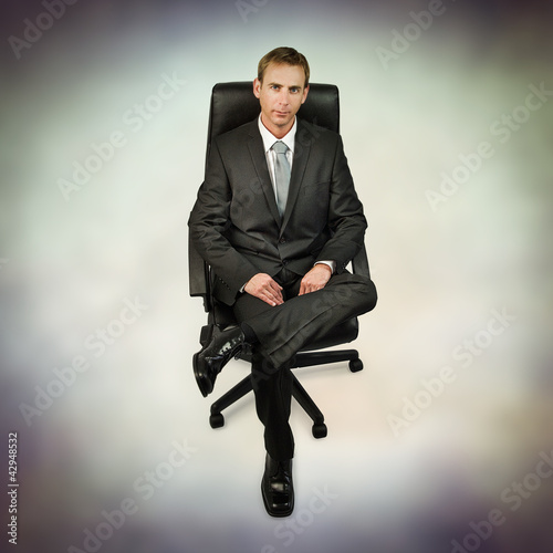 Photo: man sitting man sitting