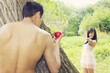 Adam holds apple