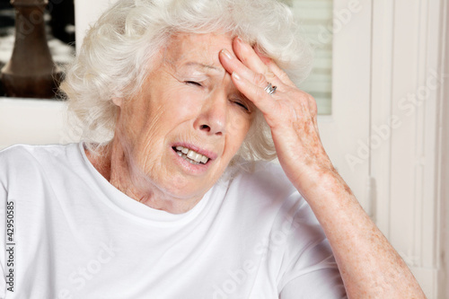 Photo: Woman With Headache Woman With Headache