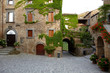 Narrow Alley With Old Buildings In Italian City