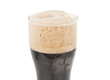 a glass of dark beer isolated