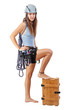 young woman in climbing equipment