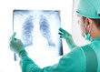 Surgeon examining a radiography