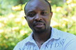 Portrait of a young african man, outdoor in park