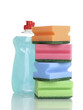 Dishwashing liquid and sponges isolated on white