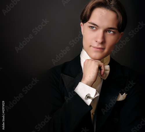 Photo: Elegant young man in suit Elegant young man in suit