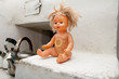 old doll in the oven