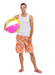 Photo: Resting on vacation smiling young man with beach ball Resting on vacation smiling young man with beach ball