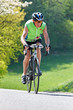 Photo: Senior fährt Fahrrad auf einem Rennrad Senior fährt Fahrrad auf einem Rennrad