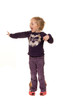 Foto: Kin mit grossen Schuhen. Symbol für Wachstum und Z Kin mit grossen Schuhen. Symbol für Wachstum und Z