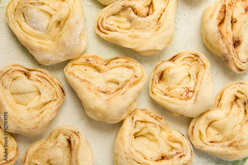 Photo: Half-finished product of a roll with cinnamon Half-finished product of a roll with cinnamon