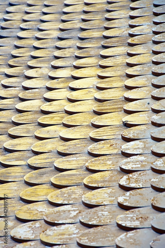 Photo: pattern of wooden roofs.old thai style. pattern of wooden roofs.old thai style.