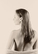Photo: A black and white back shot of a lady letting her bathrobe slipping down from her body A black and white back shot of a lady letting her bathrobe slipping down from her body