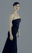 Side shot of a lady in black dinner dress