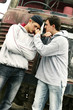 Photo: A boy threatening his friend A boy threatening his friend
