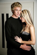Man placing his hands on his girlfriend's hips