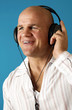 Man listening to music on his headphone