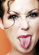 Woman sticking out her tongue