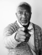 Photo: Old man pointing at the camera Old man pointing at the camera