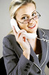 Bespectacled business woman talking on the phone