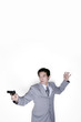Foto: Businessman aiming his pistol Businessman aiming his pistol