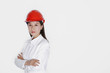 Businesswoman wearing safety helmet