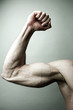 Man flexing his muscle