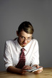 Photo: Businesswoman using calculator Businesswoman using calculator