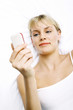 Woman text messaging on her mobile phone