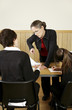 Teacher scolding her student for not completing his homework