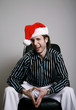 Foto: Businessman wearing a Christmas hat Businessman wearing a Christmas hat