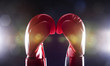 Photo : Two red boxing gloves Two red boxing gloves