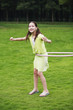Girl playing the hula hoop