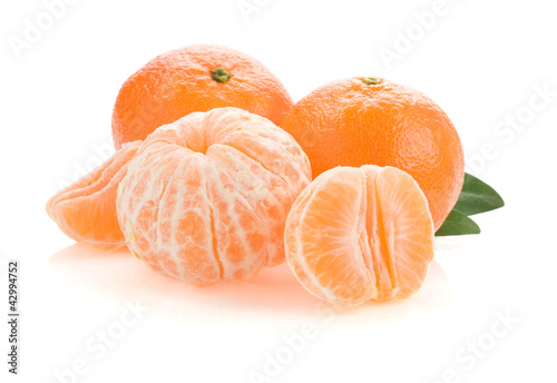 Photo: tangerine orange fruit and slices on white tangerine orange fruit and slices on white