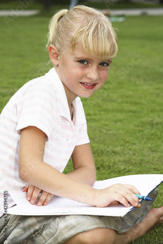 Photo: Girl drawing Girl drawing