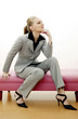 Businesswoman holding chin up