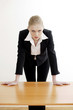 Businesswoman placing her hands on the table