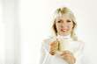 Woman holding a cup